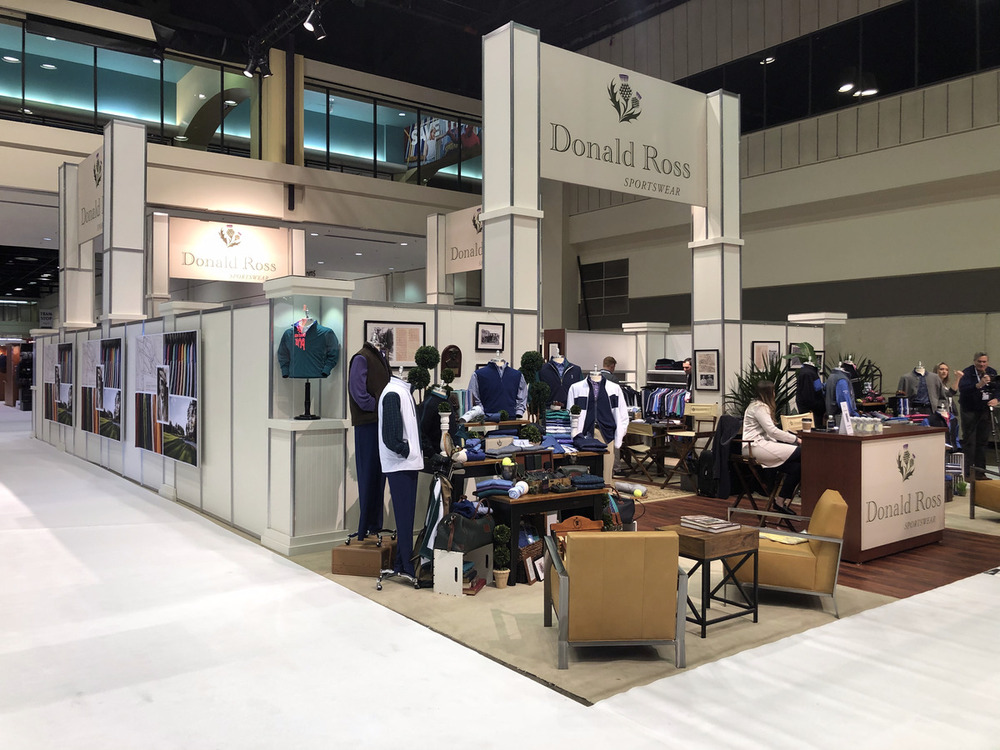 Trade show apparel booth build with branded entryway