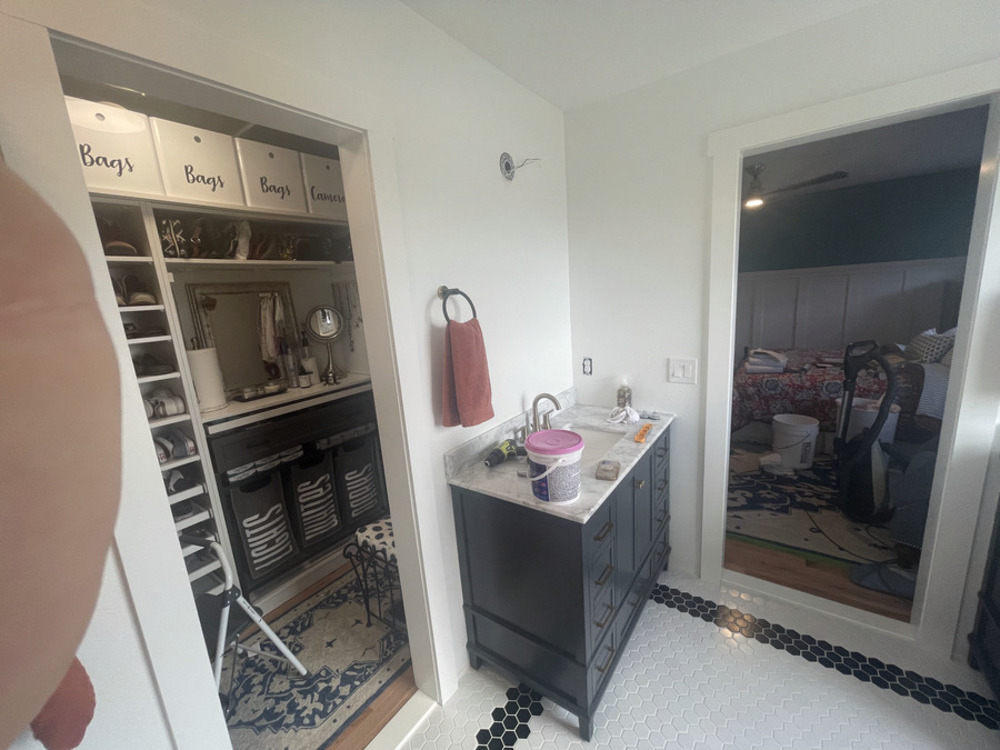 Finished custom closet system with labeled storage