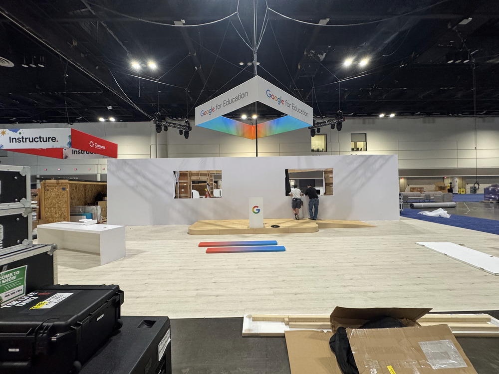 Trade show booth build in progress at a convention center